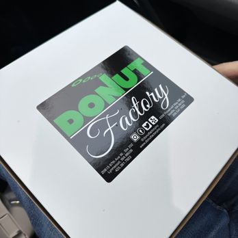 Donut Factory - a person holding a box of donuts - Donuts Near Me - Lynnwood, Washington Donut Factory - a person holding a box of donuts - Donuts Near Me - Lynnwood, Washington