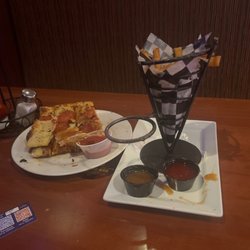 The Summit Interquest - Garlic bread with pepperoni added and funnel fries
