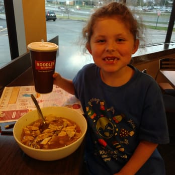 Noodles and Company - This is my 8-yr old with a bowl of chicken noodle soup. The bowl is the size of her head. The flavors are amazing! - Noodles Near Me - Omaha, Nebraska