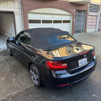 SF City Wash - BMW convertible rear exterior detail in San Francisco. Hand wash, wheel and tire cleaning by SF City Wash mobile detailing. - Auto Detailing Near Me SF City Wash - BMW convertible rear exterior detail in San Francisco. Hand wash, wheel and tire cleaning by SF City Wash mobile detailing. - Auto Detailing Near Me