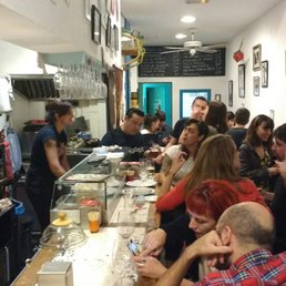 Try to get yourself a spot at the bar and chitchat with the owner or one of the people working there. They are all awesome.