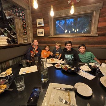 Last Chair Kitchen & Bar - Big booth and 5 happy kids. - New American Near Me - Whitefish, Montana Last Chair Kitchen & Bar - Big booth and 5 happy kids. - New American Near Me - Whitefish, Montana