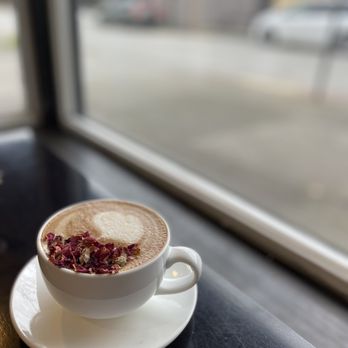 Seattle Sunshine Coffee - a cup of cappuccino on a saucer - Coffee & Tea Near Me - Seattle, Washington