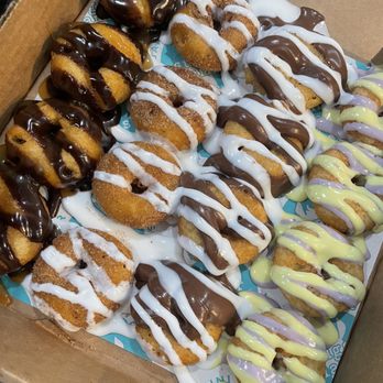 Sugar Llamas - (Left to right) Turtle, Cinnamon Roll, Nutella, Blueberry Lemon. YUMMM! - Donuts Near Me - Wichita, Kansas Sugar Llamas - (Left to right) Turtle, Cinnamon Roll, Nutella, Blueberry Lemon. YUMMM! - Donuts Near Me - Wichita, Kansas