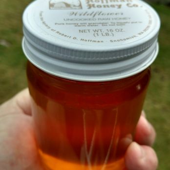 Hoffman's Honey - a hand holding a jar of honey - Honey Near Me - Snohomish, Washington Hoffman's Honey - a hand holding a jar of honey - Honey Near Me - Snohomish, Washington