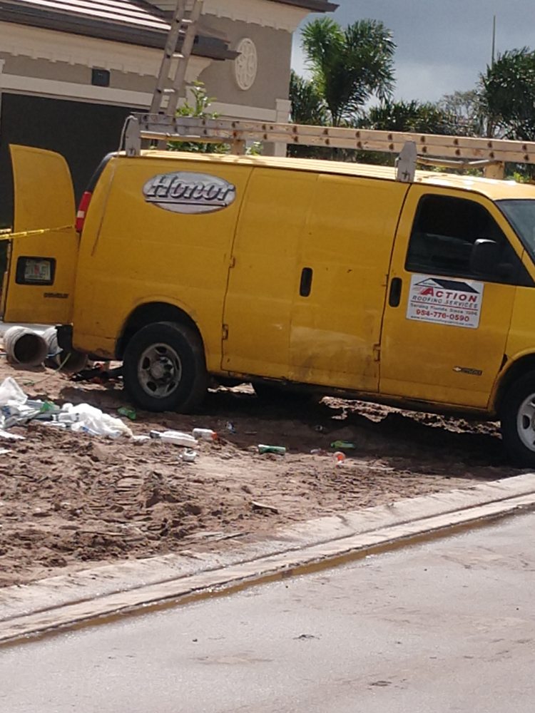 Slide of Action Roofing Services