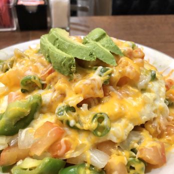 Andy's Coffee Shop - Huevos a la Mexicana: Fried tortilla, topped with beans, rice, egg, cheese, avocado, tomatoes and onions (Serano peppers optional ) - Diners Near Me - Pasadena, California Andy's Coffee Shop - Huevos a la Mexicana: Fried tortilla, topped with beans, rice, egg, cheese, avocado, tomatoes and onions (Serano peppers optional ) - Diners Near Me - Pasadena, California