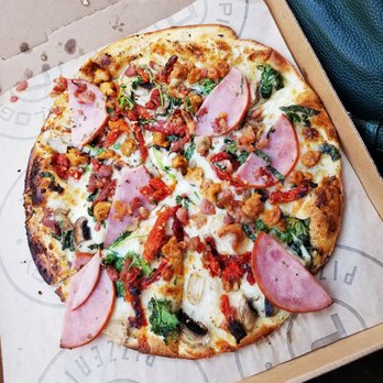 Pieology Pizzeria - Herb butter, 3 cheese alfredo, garlic, basil, spinach, sun dried tomatoes, mushrooms, oregano, canadian bacon, sausage & bacon! - Pizza Near Me - Walnut, California