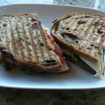 Terra Breads - Smoked turkey and asiago on black olive bread. - Bakeries Near Me - Vancouver, British Columbia Terra Breads - Smoked turkey and asiago on black olive bread. - Bakeries Near Me - Vancouver, British Columbia