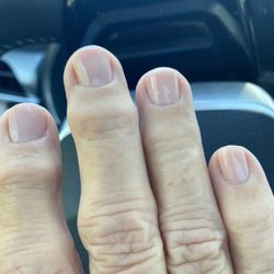 Nail Tech - Lee removed the nail gel I had and gave me a short natural cut.