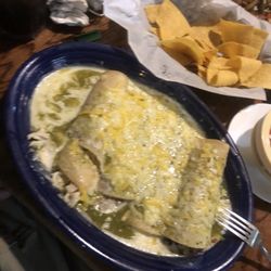Limons Mexican Restaurant - Alans chimichangas. Four enchiladas, one of them beef, one chicken, one beans, and one with cheese. They are smothered in Chile verde