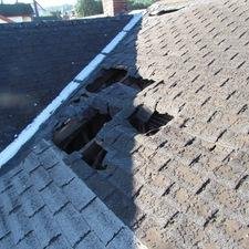 Slide of Whittle's Roofing