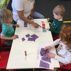Mi Casita Spanish Immersion Preschool - Hard at work learning to spell their names!