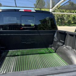 H2O Auto Spa - Truck bed full of soap that completely missed the rear window and tailgate. No rinse water even touched this half of the truck.