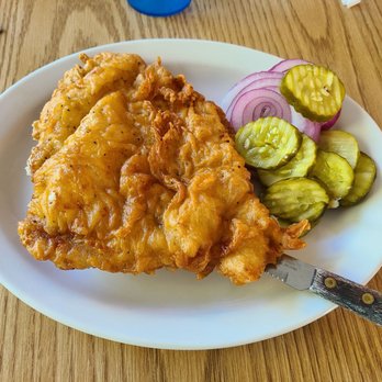 River's Edge Inn - The pork tenderloin sandwich prior to getting the top bun. It came with fries. - American Near Me - Dixon, Illinois