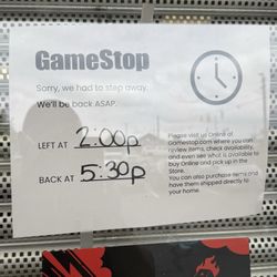Game Stop - Sign showing they are currently closed.