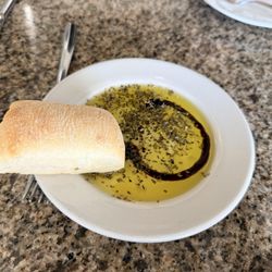 Encore Ristorante - Roll with balsamic reduction in olive oil