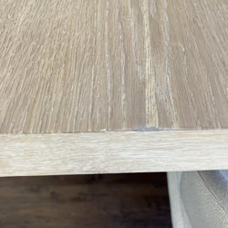 LA Furniture Store - Chips on edges of brand new table