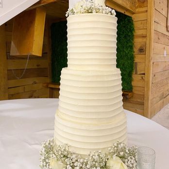 Spoon and Cake - a wedding cake on a table - Desserts Near Me - Mount Pleasant, South Carolina