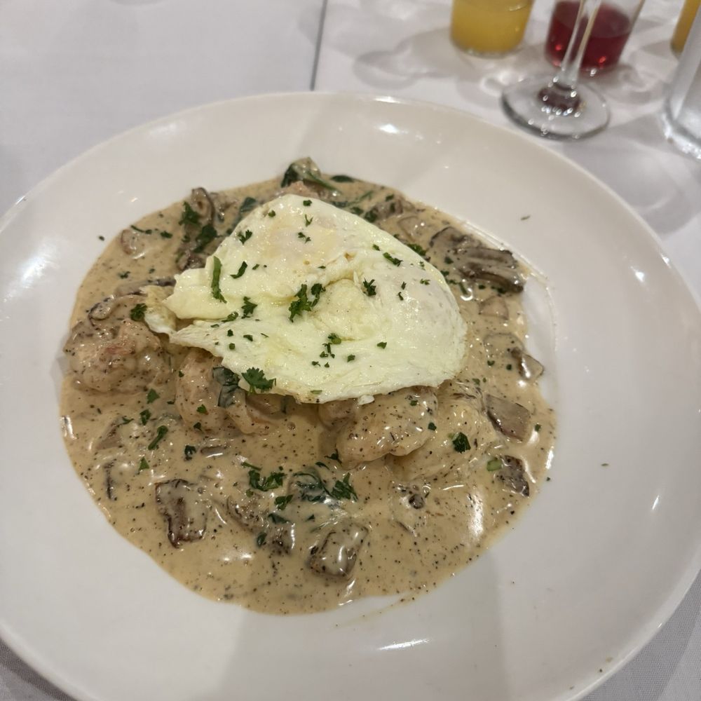 Shrimp and grits. This was wonderful, May I suggest adding the grilled garlic bread to it, with it! Shrimp and grits. This was wonderful, May I suggest adding the grilled garlic bread to it, with it!
