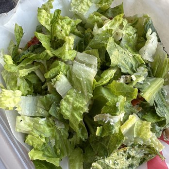 Herb & Fire - Celebration - Chopped Caesar salad: romaine, roasted tomatoes, parmesan, grilled artichokes, caesar dressing - Pizza Near Me - Grand Rapids, Michigan Herb & Fire - Celebration - Chopped Caesar salad: romaine, roasted tomatoes, parmesan, grilled artichokes, caesar dressing - Pizza Near Me - Grand Rapids, Michigan