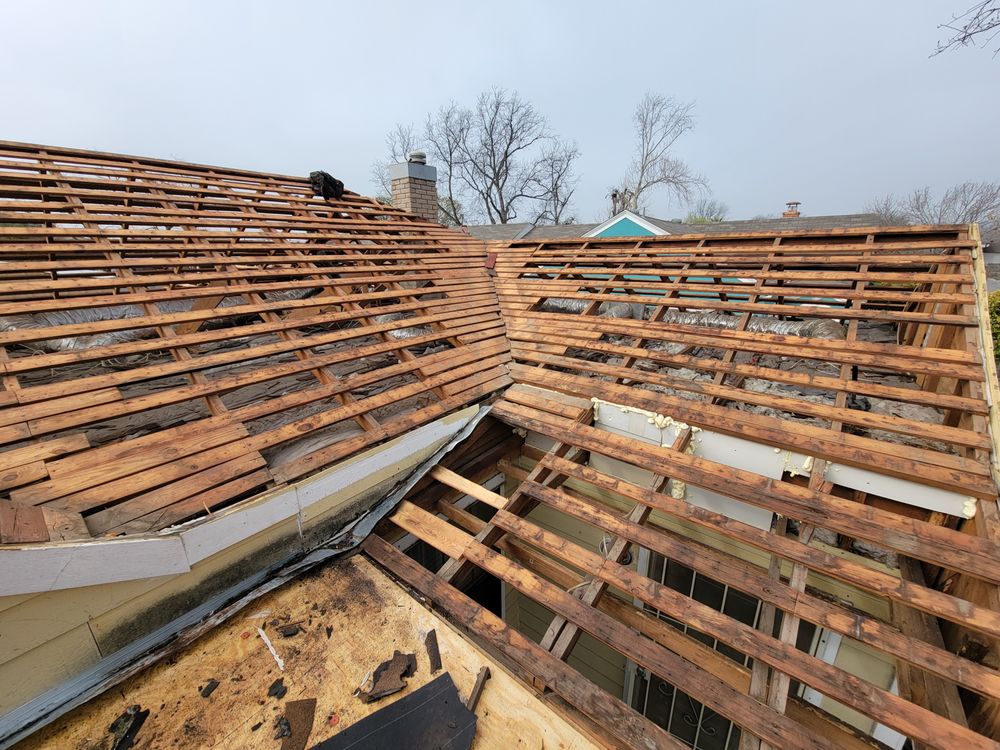 Slide of Tux Roofing