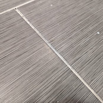 JFB Construction - cracking mortar due to subfloor movement - General Contractors Near Me