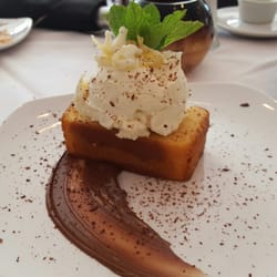 Almond pound cake with mascarpone cheese and candied lemon peel.