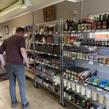 French Creek Seafood - a man in a grocery store - Seafood Markets Near Me - Parksville, British Columbia French Creek Seafood - a man in a grocery store - Seafood Markets Near Me - Parksville, British Columbia