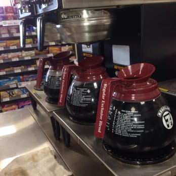 7-Eleven - a display of coffee in a store - Convenience Stores Near Me - North Highlands, California 7-Eleven - a display of coffee in a store - Convenience Stores Near Me - North Highlands, California