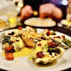 Prime 88 Steakhouse - "Oysters Rockefeller" second order was way better than the first with way more hollandaise sauce. YUM! :)...