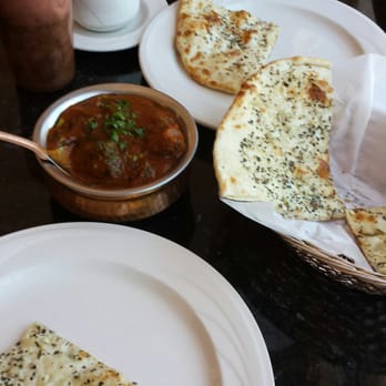 Prabh Indian Kitchen - Basil garlic Nan and lamb curry. My luncheon companion Melina says the Nan is the bomb. - Indian Near Me - Mill Valley, California Prabh Indian Kitchen - Basil garlic Nan and lamb curry. My luncheon companion Melina says the Nan is the bomb. - Indian Near Me - Mill Valley, California