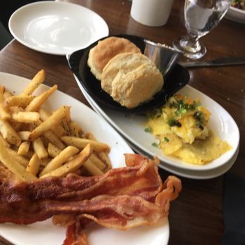 Laura Lee's - Fries, bacon, scrambled eggs, and biscuits with honey butter. My à la carte meal - New American Near Me - Richmond, Virginia
