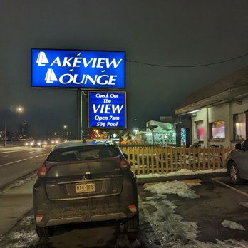 Lakeview Lounge - a car parked on the side of the road - Dive Bars Near Me - Edgewater, Colorado