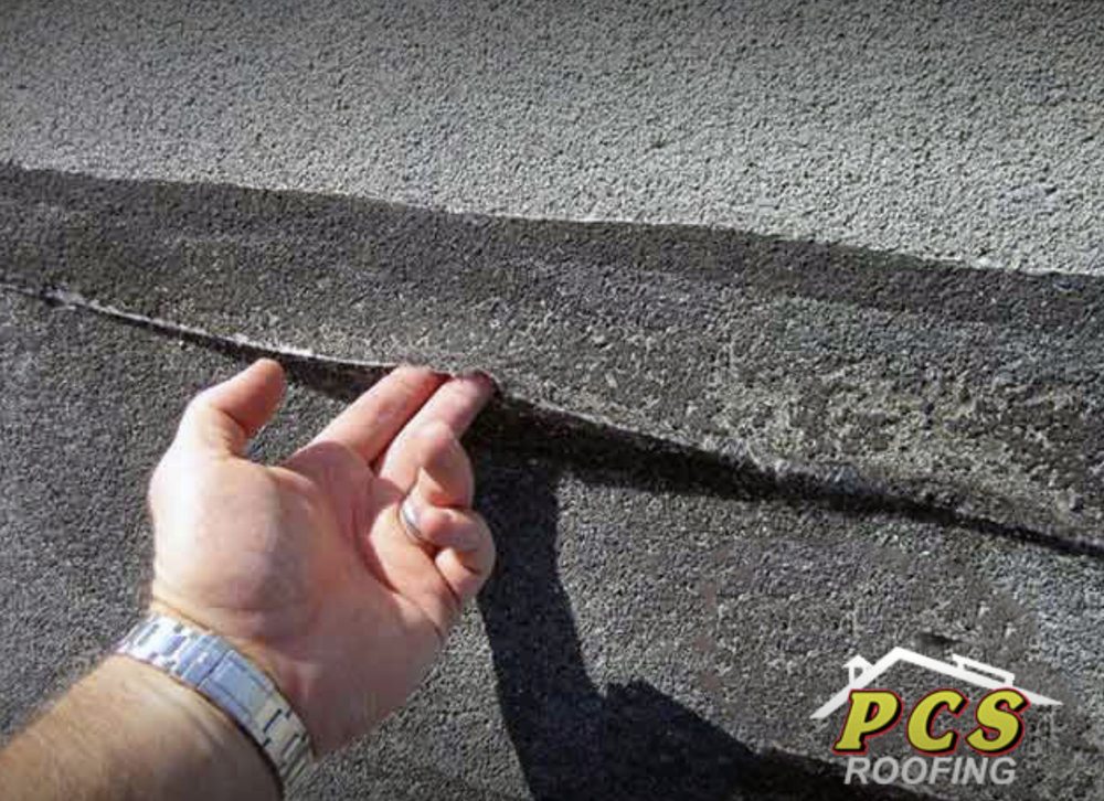 Slide of PCS Roofing