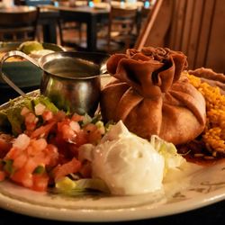 KAVAS Tacos + Tequila - Chicken Chimichanga: fried flour tortilla stuffed with shredded chicken and Mexican cheese ($21).