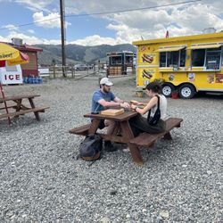 Local Advice - Picnic tables with games cute place to eat outside and enjoy the view