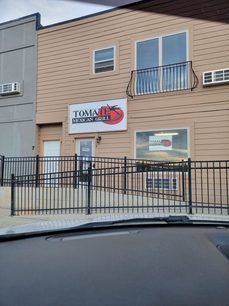 Tomate Mexican Grill Logo