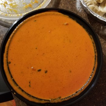 Delhi 6 Indian cuisine - Butter chicken. (There is plenty of chicken under that sauce) - Indian Near Me - Frederick, Maryland