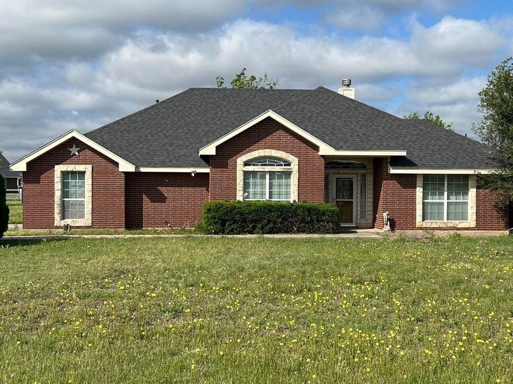 Slide of Thornton’s Roofing Company