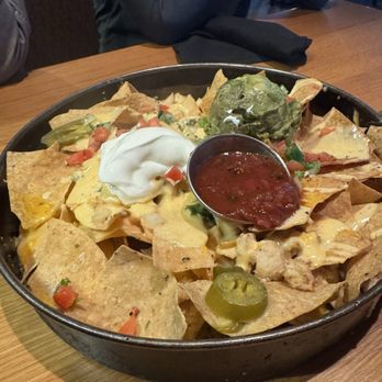 BJ's Restaurant & Brewhouse - Deep Dish Nachos with chicken - Breweries Near Me - Taylor, Michigan BJ's Restaurant & Brewhouse - Deep Dish Nachos with chicken - Breweries Near Me - Taylor, Michigan