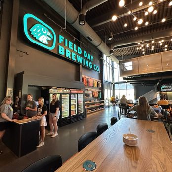 Field Day Brewing - Indoor seating, merch wall, cold case - Breweries Near Me - North Liberty, Iowa