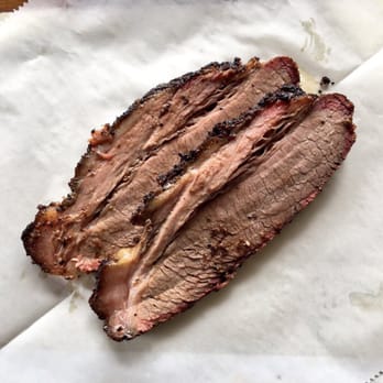 Zeke's BBQ - a piece of meat on a piece of paper - Barbeque Near Me - Windthorst, Texas