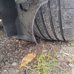 Zolman Tire - Plastic dragging under my tire i had to try pry out on the way home in the rain. To no avail.