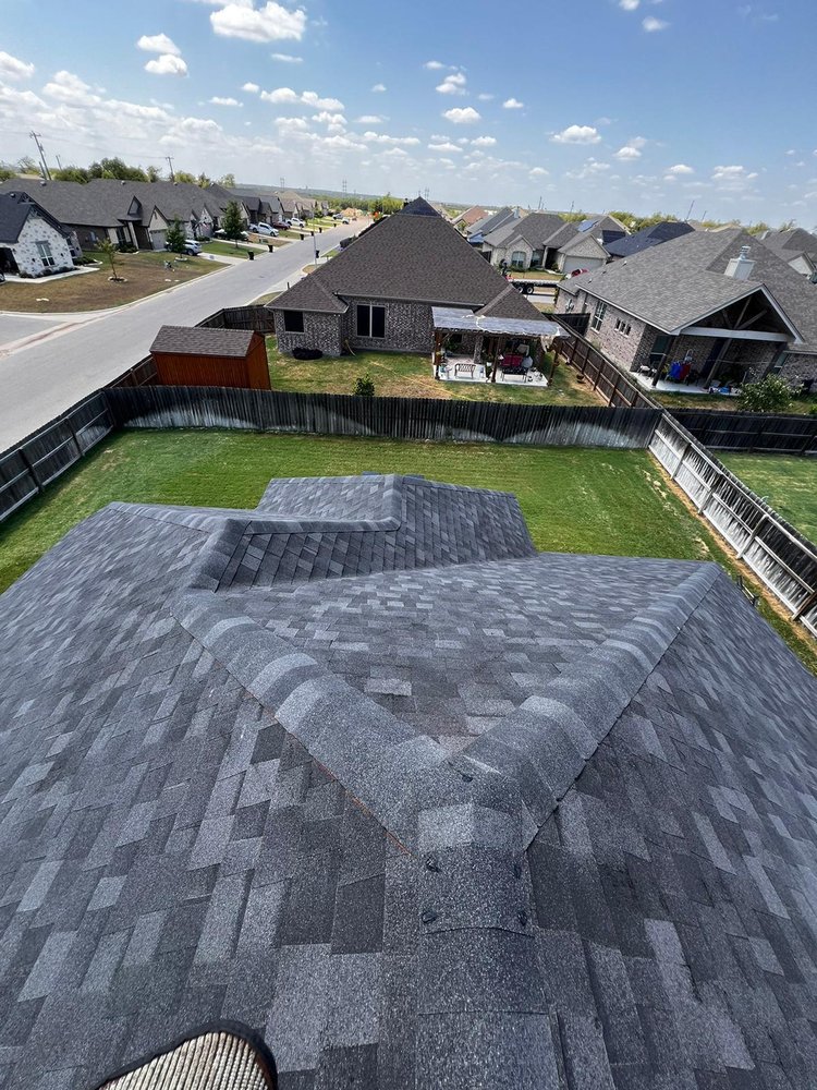 Slide of Los Speedy Rooferos