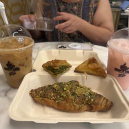 SMALL SMALL PISTACHIO BAKLAVA 2PC, PISTACHIO ROSE CROISSANT, Iced Adeni Chai, Pink Drink SMALL SMALL PISTACHIO BAKLAVA 2PC, PISTACHIO ROSE CROISSANT, Iced Adeni Chai, Pink Drink