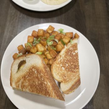 Soufflé Cafe & Bistro - Breakfast Sandwich with taters - Cafes Near Me - Cibolo, Texas Soufflé Cafe & Bistro - Breakfast Sandwich with taters - Cafes Near Me - Cibolo, Texas