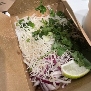 Kati Vegan Thai - The noodles, sprouts, fried noodles, red onion and lime slices to add to the soup - Thai Near Me - Seattle, Washington Kati Vegan Thai - The noodles, sprouts, fried noodles, red onion and lime slices to add to the soup - Thai Near Me - Seattle, Washington