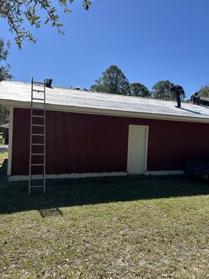 Greg’s roofing and Remodeling Logo