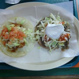 Pollo taco and carne asada sope. Pollo taco and carne asada sope.